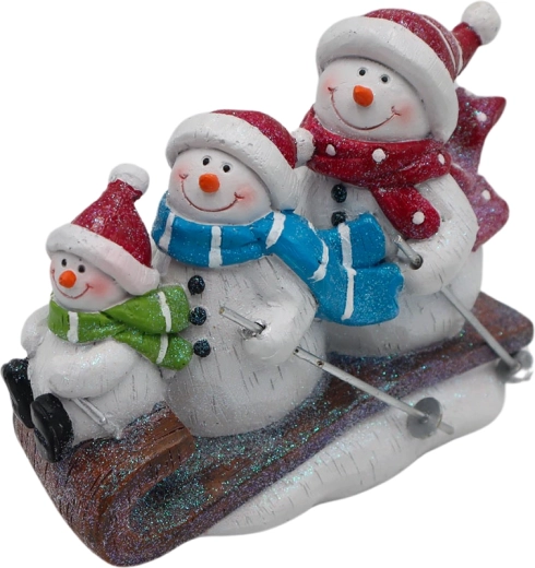 Decorațiune familie de oameni de zăpadă pe sanie