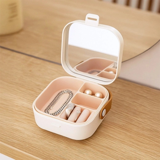 Oglindă încorporată pentru retușuri rapide oriunde