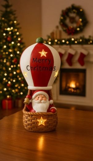 Figurină de Crăciun cu Moș Crăciun în balon cu aer cald cu lumini LED 20 × 20 × 43 cm