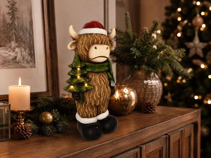 Figurină decorativă de Crăciun vacă de munte cu brăduț LED